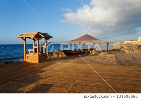 Montana Roja mountain on Tenerife coast near El Medano, Canary Islands, Spain, sunny summer day Montana Roja mountain on Tenerife coast near El Medano, Canary Islands, Spain, sunny summer day 131608666