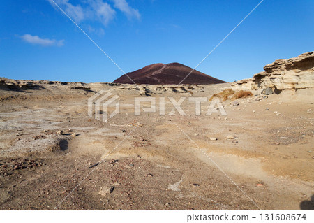 Montana Roja mountain on Tenerife coast near El Medano, Canary Islands, Spain, sunny summer day Montana Roja mountain on Tenerife coast near El Medano, Canary Islands, Spain, sunny summer day 131608674