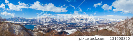 A view of the snow-capped Hokushin Gogaku mountains and Lake Nojiri from the observation deck of a ski resort (taken from Madarao Plateau, Nagano Prefecture) 131608830