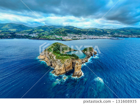 Vila Franca Islet, Vila Franca Do Campo Town and Atlantic Ocean. Azores, Sao Miguel Island. Portugal Vila Franca Islet, Vila Franca Do Campo Town and Atlantic Ocean. Azores, Sao Miguel Island. Portugal 131608935