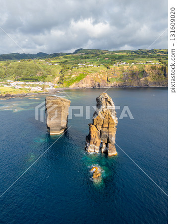 Sea Stacks near Mosteiros Beach and Atlantic Ocean. Azores, Sao Miguel Island. Portugal. Aerial View 131609020
