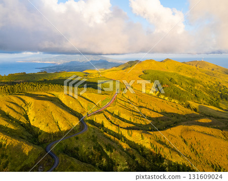 Green Forest Hills at Sunset. Atlantic Ocean. Azores, Sao Miguel Island, Portugal. Aerial View 131609024