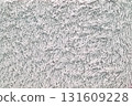 A white towel with a fuzzy texture 131609228