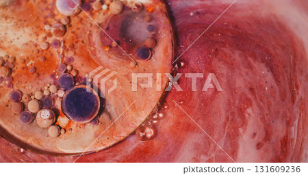 Paint bubbles. Oil background. Defocused purple orange color glitter acrylic blend liquid round flow shiny texture on art abstraction. Paint bubbles. Oil background. Defocused purple orange color glitter acrylic blend liquid round flow shiny texture on art abstraction. 131609236