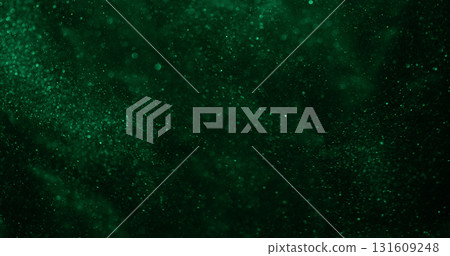 Blur particles. Glitter texture. Natural green color illuminated glare shimmer art floating on abstract bokeh dark black background. 131609248