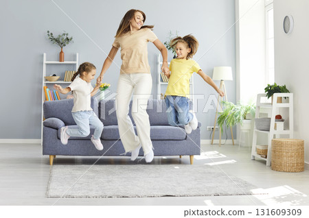 Parent And Kids Having Fun Together At Home Parent And Kids Having Fun Together At Home 131609309
