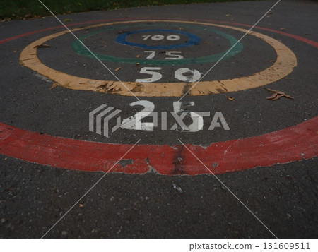 a child game on the asphalt with numbers.jumping. a child game on the asphalt with numbers.jumping. 131609511