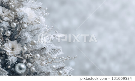 Elegant white Christmas tree decorated with silver ornaments 131609584