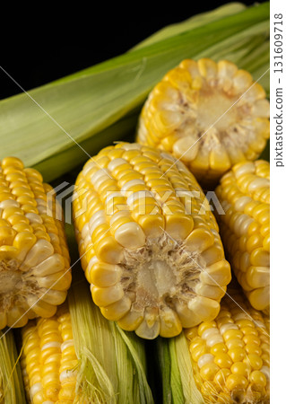 Close-up pile of fresh ripe corn cobs. Close-up pile of fresh ripe corn cobs. 131609718