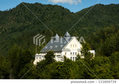 A perfect picture of the world, a house in the mountains in the middle of nature and silence. 131609739