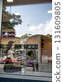 Young Woman Reflected Reading 131609805