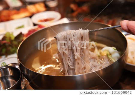 Korean cold noodles in chilled broth 131609942