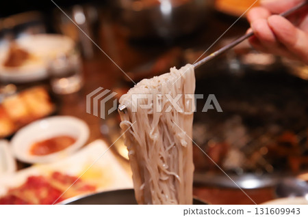 Korean cold noodles in chilled broth 131609943