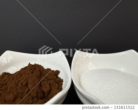 Bowls of coffee and sugar on dark background. Bowls of coffee and sugar on dark background. 131611522
