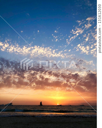 Sailboat in Golden Sunset Glow Sailboat in Golden Sunset Glow 131612030