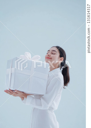 woman shirt gift eyes mouth box holding closed 131614317