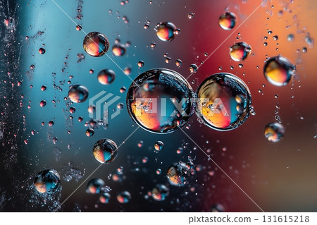 Colorful Reflections in Water Droplets on Glass with Vibrant Background and Artistic Effect Colorful Reflections in Water Droplets on Glass with Vibrant Background and Artistic Effect 131615218