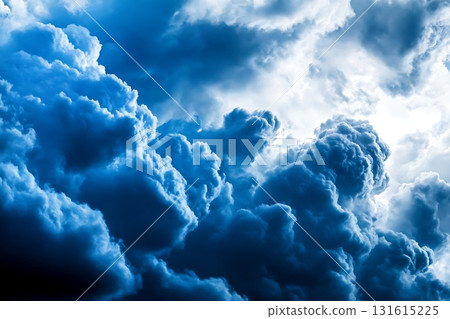 Dramatic Blue Clouds Gather as Storm Approaches, Soft Light Breaks Through Heavy Skies 131615225
