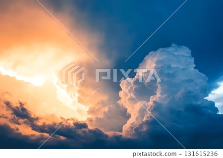 Dramatic Cloud Formation at Sunset with Orange and Blue Tones in the Sky 131615236