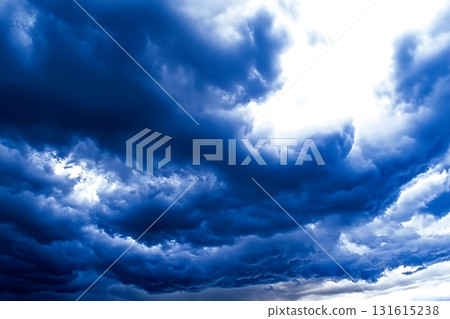 Dramatic Blue Storm Clouds with Ridges and Dynamic Patterns in the Sky 131615238