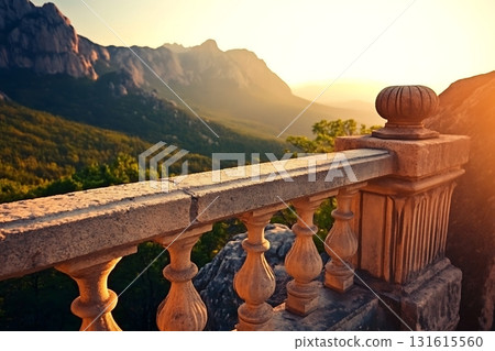 Scenic View of Mountain Landscape with Stone Railing at Sunrise Overlooking Nature 131615560