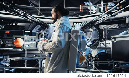 Astronaut monitoring life support systems before stepping out for scheduled operations outside space station. Cosmonaut verifying mission parameters after landing on red planet Astronaut monitoring life support systems before stepping out for scheduled operations outside space station. Cosmonaut verifying mission parameters after landing on red planet 131615624
