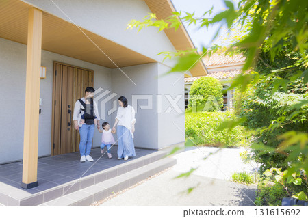 Family at the entrance going out 131615692