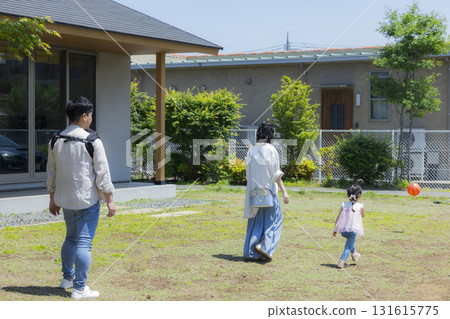 Family playing in the garden Family playing in the garden 131615775