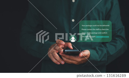 Adult man holding smartphone with phishing scam message alert about bank login, cybersecurity threats, identity theft, representing online fraud and internet safety awareness. 131616289