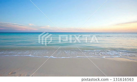 Serene Beach at Sunset with Soft Waves and Peaceful Sky in Vibrant Colors 131616563
