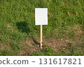 Empty sign on a land, green grass 131617821
