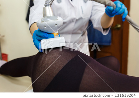 LPG massage procedure for removing subcutaneous fat from a young woman. LPG massage procedure for removing subcutaneous fat from a young woman. 131619204