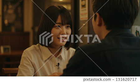 AI-generated image of two people getting closer at a cafe AI-generated image of two people getting closer at a cafe 131620717
