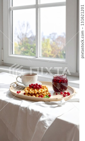 Delicious fresh fruit and pastry breakfast meal on the table or terrace 131621201