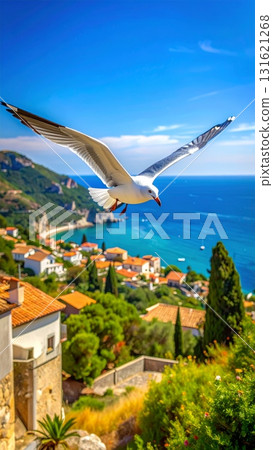 Seagull soaring over a Mediterranean city coastline panorama with summer sky, a perfect view of nature and architecture on vacation 131621268