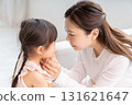 Mother and girl talking 131621647