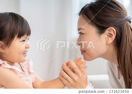 Mother and girl talking 131621650