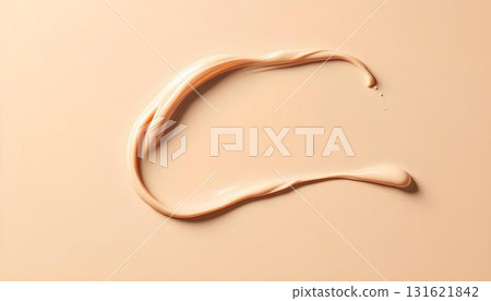 Cream liquid being poured onto a white background, suggesting skincare or cosmetic application for acne treatment 131621842