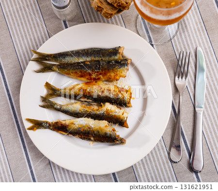 Fried sardine fish served on plate 131621951