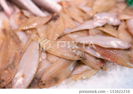 Peled fish in ice on a fish market counter close up 131622258