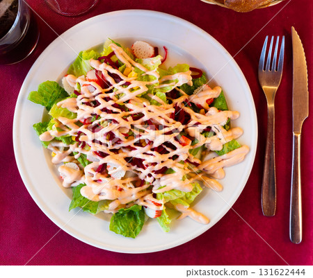 Salad with crab meat, lettuce, corn, beet and pink sauce Salad with crab meat, lettuce, corn, beet and pink sauce 131622444