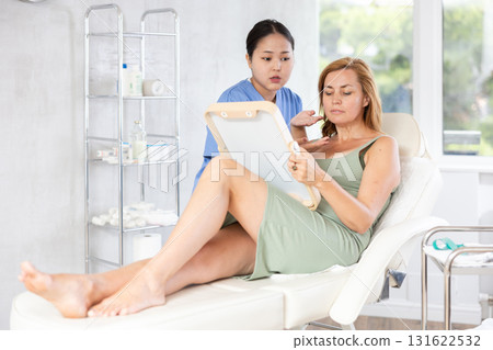 young doctor consulting with mirror 131622532