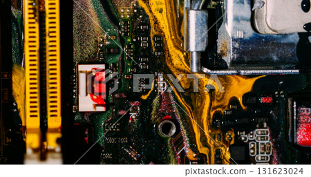 Ink flow. Digital hardware. Blur yellow green red colorful glitter water dark black electronic microchip on abstract art background. Ink flow. Digital hardware. Blur yellow green red colorful glitter water dark black electronic microchip on abstract art background. 131623024