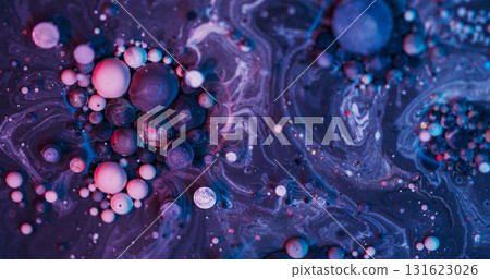 Sparkling bubbles. Paint background. Blur purple blue color glitter texture round flow oil pigment circle on acrylic art abstraction. Sparkling bubbles. Paint background. Blur purple blue color glitter texture round flow oil pigment circle on acrylic art abstraction. 131623026