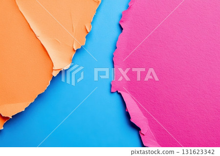 Colorful torn paper pieces creating an abstract background design 131623342
