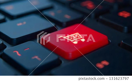 A keyboard featuring a red shopping cart button, representing e-commerce and discounts during holiday sales 131623797