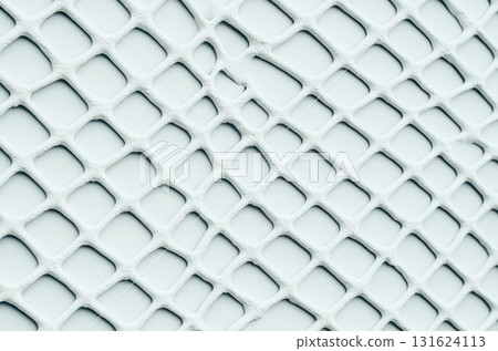 A detailed view of a textured surface displaying an intricate geometric pattern 131624113