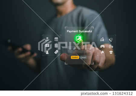 Close up Hand Man Using Smartphone to Confirm Payment with Virtual Interface Showing Successful Transaction and Digital Symbols in Modern Environment 131624312