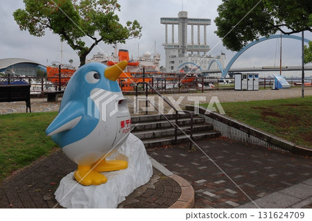 Penguin Post and Port Building in front of Port of Nagoya Aquarium 131624709