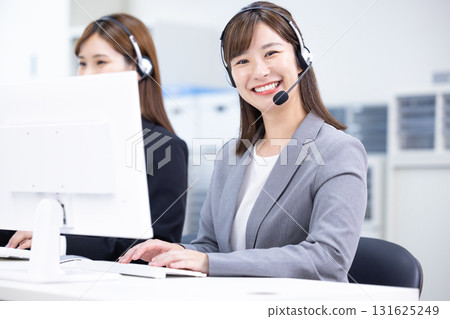 Business woman wearing an intercom 131625249